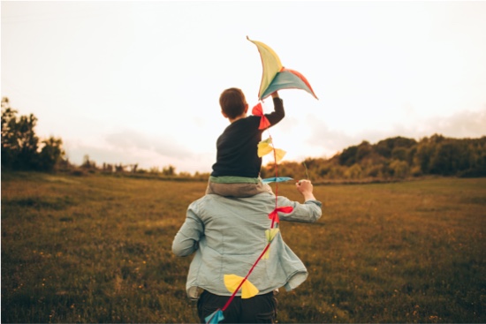 kid on shoulders